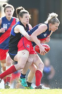 0919_APP_620.jpg Diamond Creek's Christina Bernadi is tackled by former teammate and Melbourne University's Alicia Eva. Image: AFL Photos. - AFLW,Collingwood Magpies,Stephanie Chiocci,Christina Bernardi,Emma Grant,Amelia Barden
